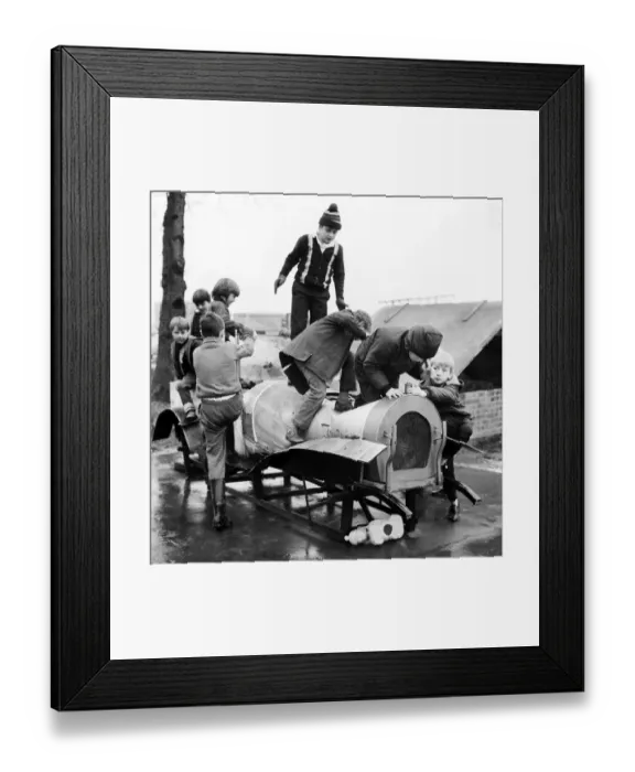 Framed Print : Children playing in the adventure playground at Basildon town centre, Essex Framed Print : Children playing in the adventure playground at Basildon town centre, Essex