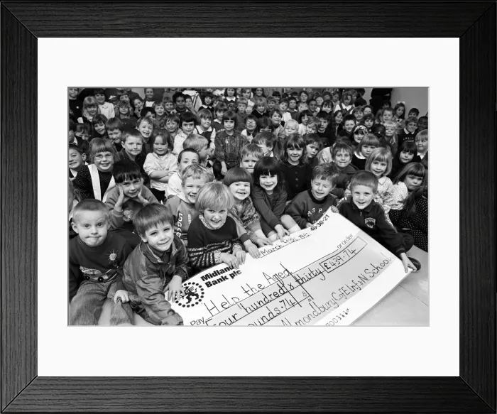 Framed Print : Fund-raising is childs play - thats what pupils at Almondbury Infant School