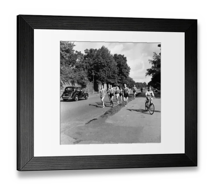Framed Print : Joggers in Hampstead, north London. 24th September 1954 Framed Print : Joggers in Hampstead, north London. 24th September 1954