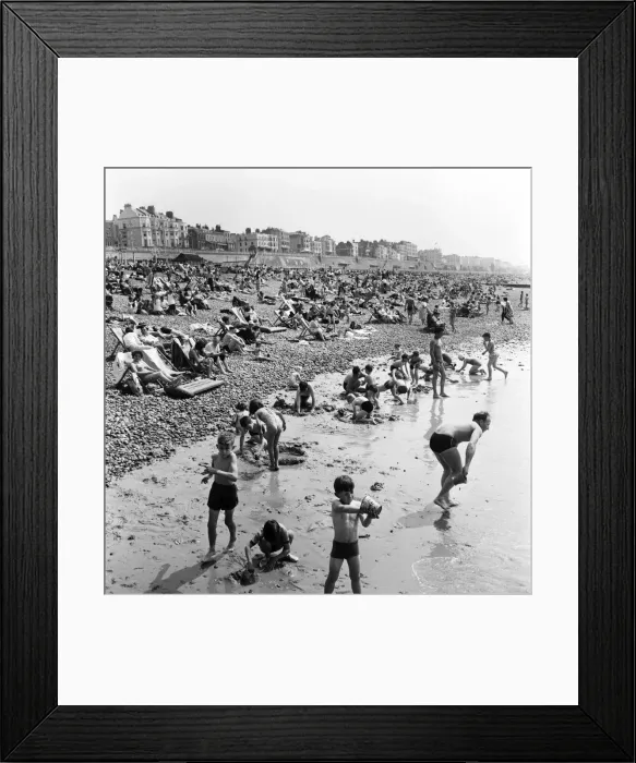 Framed Print : Crowded scenes on Brighton Beach as holidaymakers enjoy the hot summer weather Framed Print : Crowded scenes on Brighton Beach as holidaymakers enjoy the hot summer weather