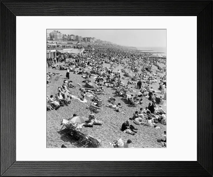 Framed Print : Crowded scenes on Brighton Beach as holidaymakers enjoy the hot summer weather Framed Print : Crowded scenes on Brighton Beach as holidaymakers enjoy the hot summer weather