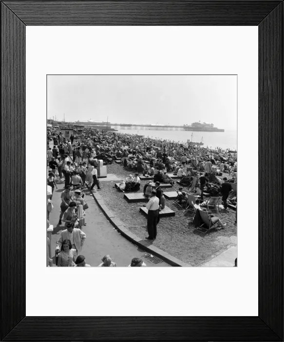 Framed Print : Crowded scenes on Brighton Beach as holidaymakers enjoy the hot summer weather Framed Print : Crowded scenes on Brighton Beach as holidaymakers enjoy the hot summer weather