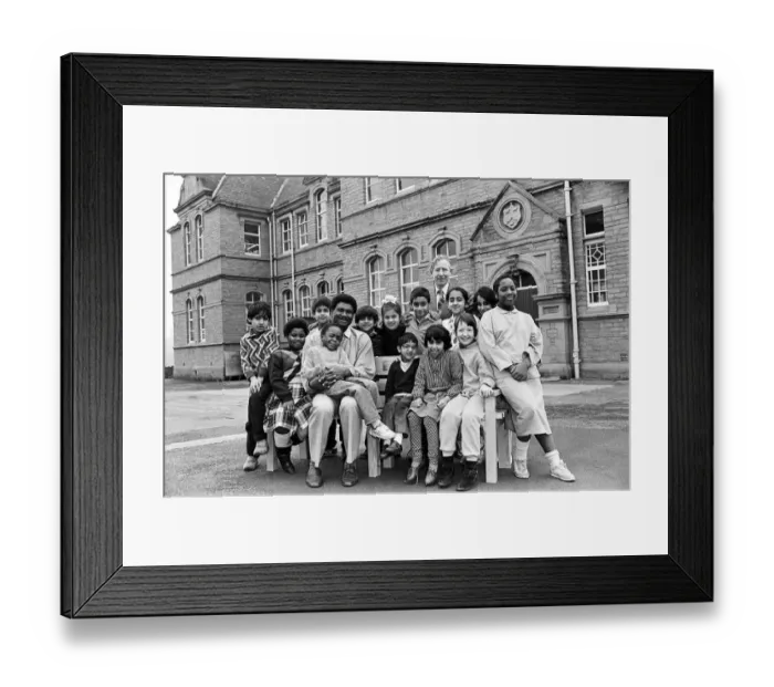 Framed Print : Sitting pretty... thats Huddersfield Caribbean Association manager Mr Denzil Nurse