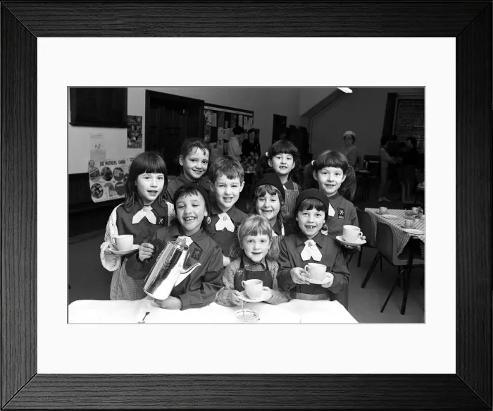 Framed Print : Service with a smile... pouring out the coffees are these Slaithwaite Brownies who raised Framed Print : Service with a smile... pouring out the coffees are these Slaithwaite Brownies who raised