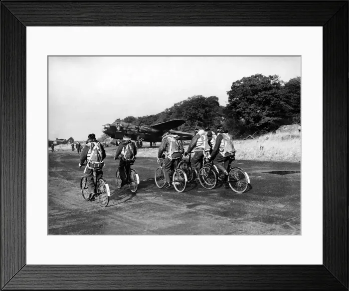 Framed Print : Images believes to show aircrew members of the 106th Bomber Squadron seen here cycling Framed Print : Images believes to show aircrew members of the 106th Bomber Squadron seen here cycling