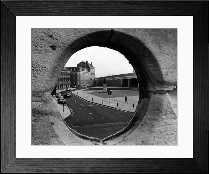 Framed Print : New look Middlesbrough is taking shape, framed here by the pitted stonework of Framed Print : New look Middlesbrough is taking shape, framed here by the pitted stonework of