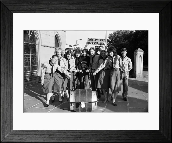 Framed Print : These young barrel boys and girls hope the money will come rolling in from a wacky Framed Print : These young barrel boys and girls hope the money will come rolling in from a wacky