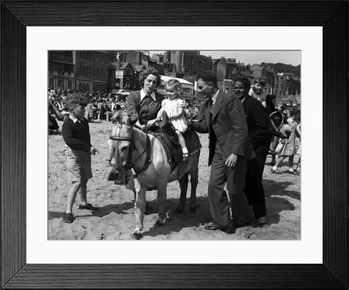Framed Print : Holiday time in Scarborough, North Yorkshire. June 1954 Framed Print : Holiday time in Scarborough, North Yorkshire. June 1954