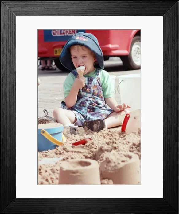 Framed Print : Children from Kids & Co. Nursery spend the morning playing with the sand in Framed Print : Children from Kids & Co. Nursery spend the morning playing with the sand in