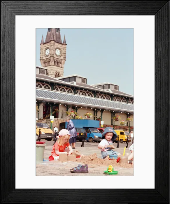 Framed Print : Children from Kids & Co. Nursery spend the morning playing with the sand in