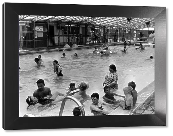 Holiday makers enjoy the Swimming Pool at the Sun Centre, Trecco Bay, Porthcawl, Bridgend
