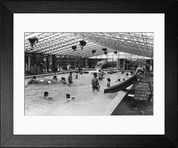 Framed Print : Holiday makers enjoy the Swimming Pool at the Sun Centre, Trecco Bay, Porthcawl, Bridgend Framed Print : Holiday makers enjoy the Swimming Pool at the Sun Centre, Trecco Bay, Porthcawl, Bridgend