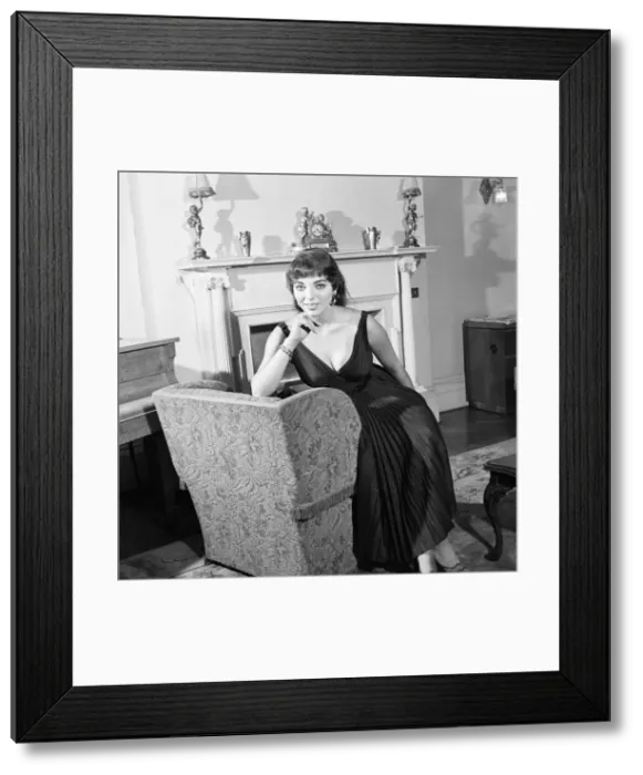 Framed Print : Joan Collins, actress, aged 22, pictured wearing black silk cocktail dress Framed Print : Joan Collins, actress, aged 22, pictured wearing black silk cocktail dress