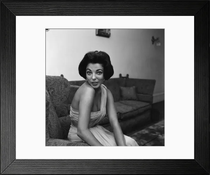 Framed Print : Joan Collins, actress, has recently returned from a holiday in the South of France Framed Print : Joan Collins, actress, has recently returned from a holiday in the South of France