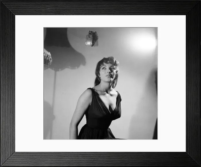 Framed Print : Joan Collins, actress, aged 22, pictured wearing black silk cocktail dress Framed Print : Joan Collins, actress, aged 22, pictured wearing black silk cocktail dress