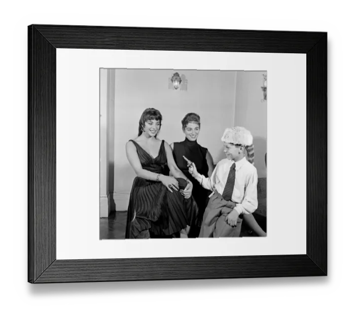 Framed Print : Joan Collins, actress, aged 22, pictured wearing black silk cocktail dress
