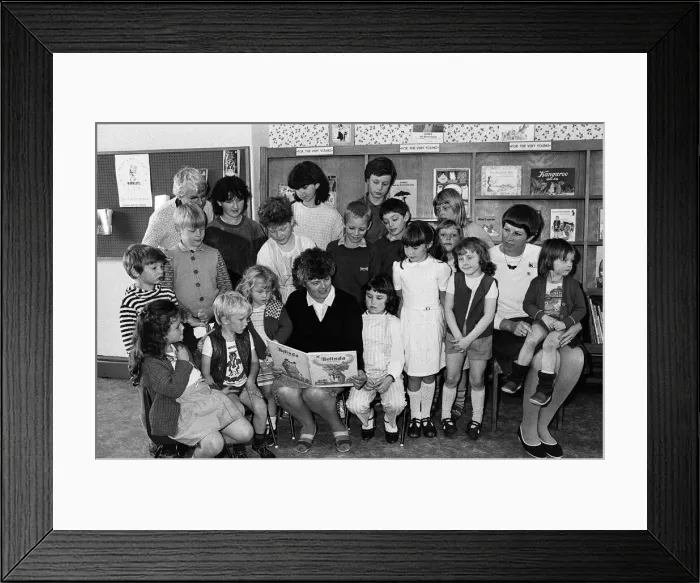 Framed Print : Librarian Mrs. Enid Blackburn reads to some of the children who attended a story time Framed Print : Librarian Mrs. Enid Blackburn reads to some of the children who attended a story time