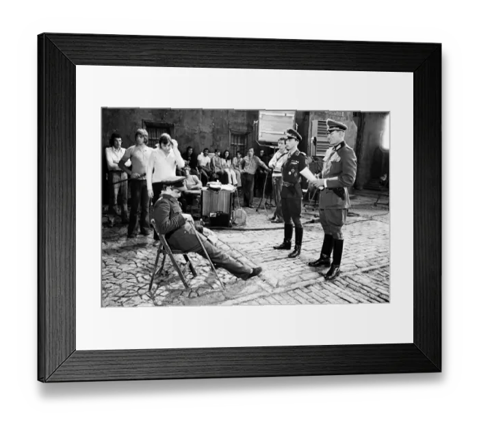 Framed Print : Actor David McCallum (seated) on the film set during filming of Colditz Framed Print : Actor David McCallum (seated) on the film set during filming of Colditz