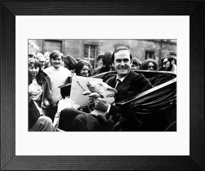 Framed Print : John Cleese at St Andrews ready for a drive around with a piglet Framed Print : John Cleese at St Andrews ready for a drive around with a piglet