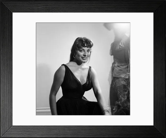Framed Print : Joan Collins, actress, aged 22, pictured wearing black silk cocktail dress