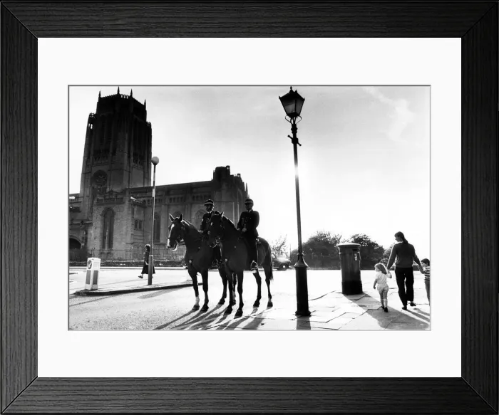 Framed Print : Police mounted on horses patrol the area around Liverpool Anglican Cathedral Framed Print : Police mounted on horses patrol the area around Liverpool Anglican Cathedral