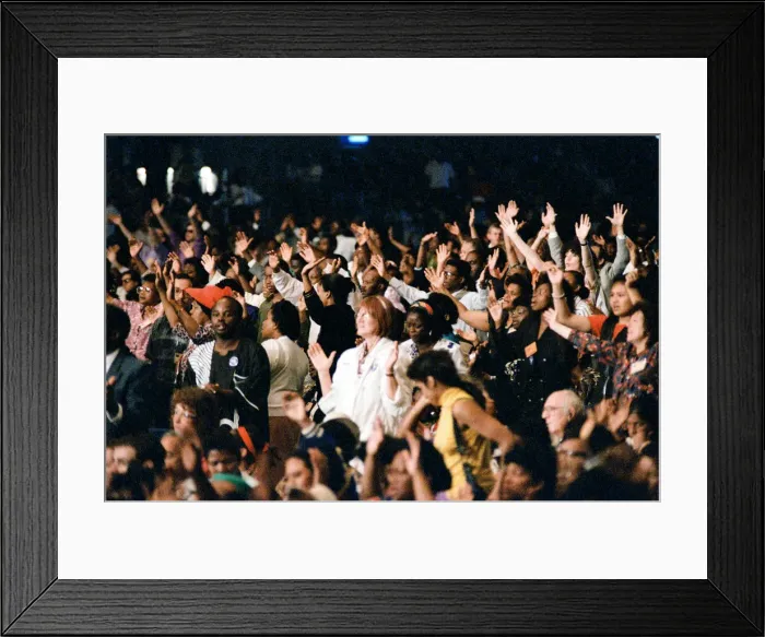 Framed Print : Crowds listening to Maurice Cerullo, an American pentecostal televangelist during his