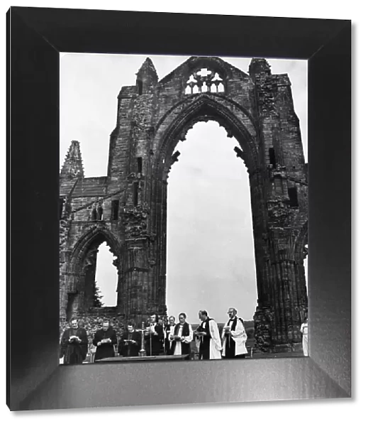 A service takes place at Guisborough Priory. 18th May 1975