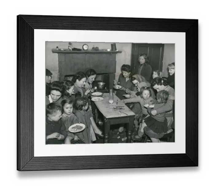 Framed Print : Around thirty women and children enjoying their Sunday dinner in there single end at 26a Framed Print : Around thirty women and children enjoying their Sunday dinner in there single end at 26a