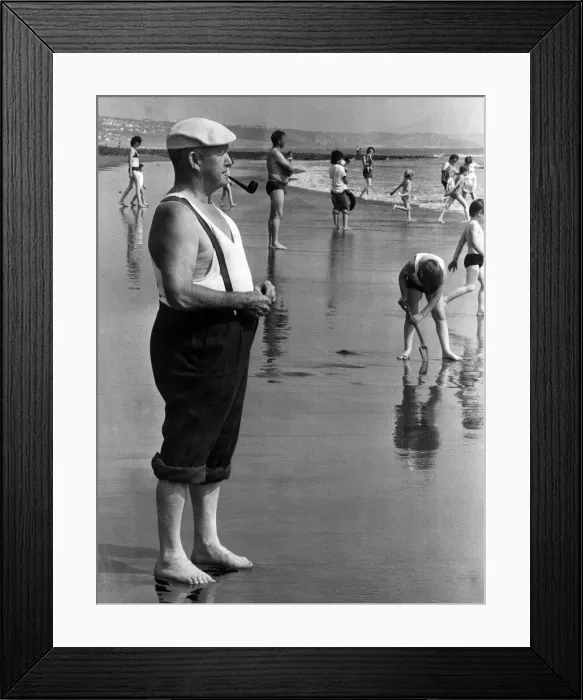 Framed Print : The old and the new... retired miner JOhn James aged 63 from Cwmbran still enjoys