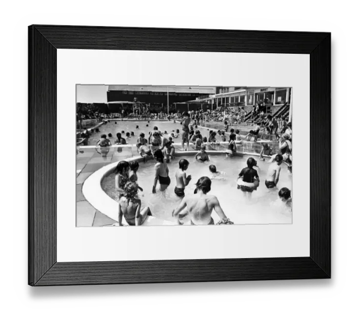 Framed Print : Holiday makers enjoy the Swimming and Paddling Pools at Trecco Bay Porthcawl South Wales Framed Print : Holiday makers enjoy the Swimming and Paddling Pools at Trecco Bay Porthcawl South Wales