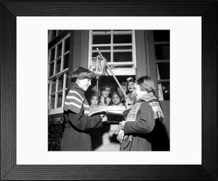 Framed Print : Children singing Christmas carols with a hanging lantern Framed Print : Children singing Christmas carols with a hanging lantern