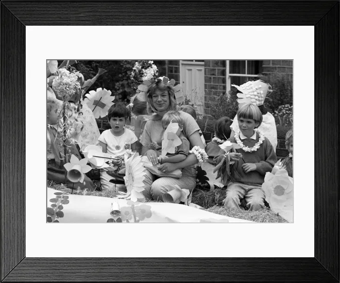 Framed Print : Hundreds lined streets to watch the annual Skelmanthorpe carnival procession through Framed Print : Hundreds lined streets to watch the annual Skelmanthorpe carnival procession through