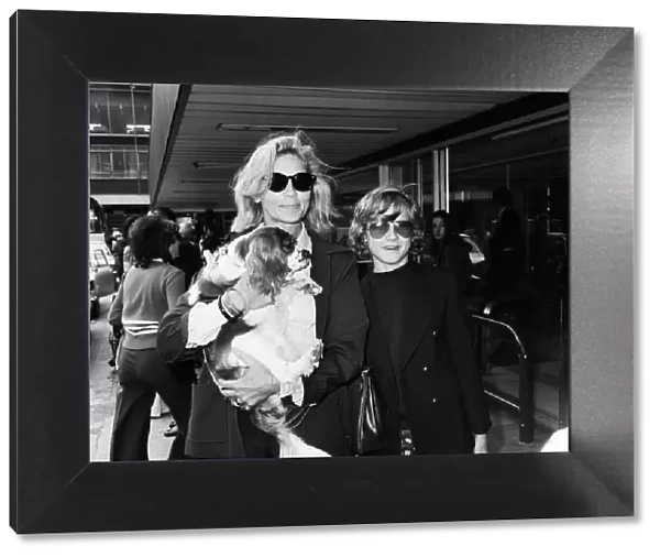 Actress Lauren Bacall at Heathrow Airport with her son Sam (12)