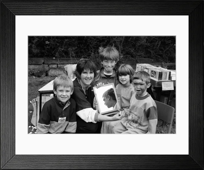 Framed Print : Mirror mirror... face painter Mrs Louise Warwick lets Kyle Warwick takes a look at her Framed Print : Mirror mirror... face painter Mrs Louise Warwick lets Kyle Warwick takes a look at her