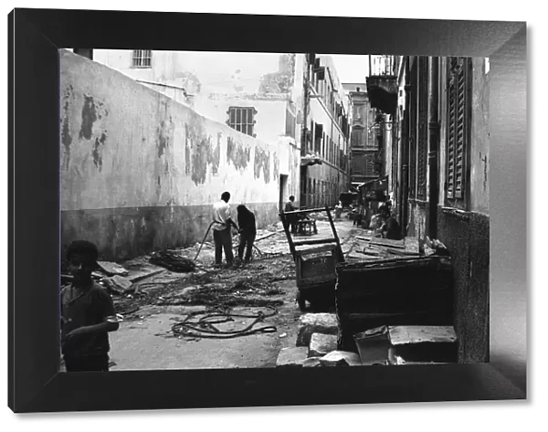 Fishermen seen here repairing their nets in a Alexandria back street. 29th May 1976