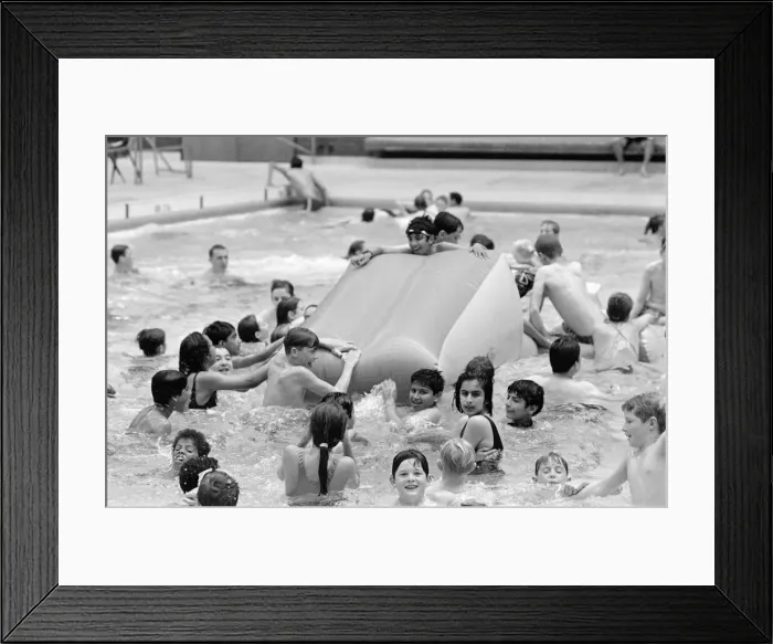 Framed Print : In the swim E EYoungsters make a splash in this field sports centre drink the fourth