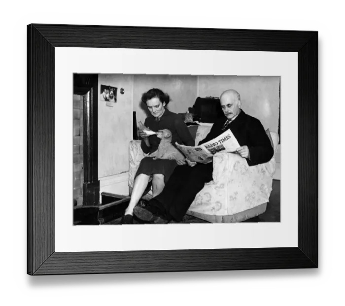 Framed Print : George Mottershead, Curator of Chester Zoo, pictured at home with wife Elizabeth