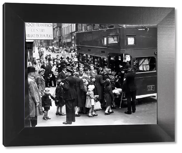 Flashback to the dark days of 1939, as Liverpool children board a bus to take them to