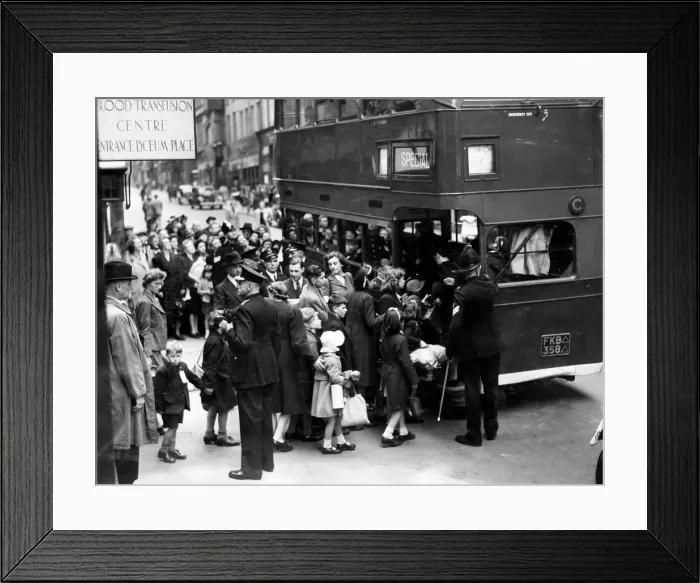 Framed Print : Flashback to the dark days of 1939, as Liverpool children board a bus to take them to