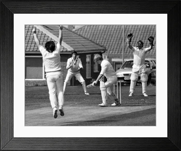 Framed Print : Waiting their turn to go out to bat are the members of Middlesbrough cricket team who Framed Print : Waiting their turn to go out to bat are the members of Middlesbrough cricket team who