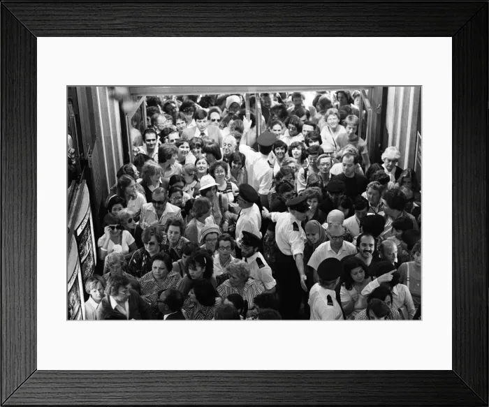 Framed Print : Crowds wait at the entrance to Harrods during the sale. 15th July 1979 Framed Print : Crowds wait at the entrance to Harrods during the sale. 15th July 1979