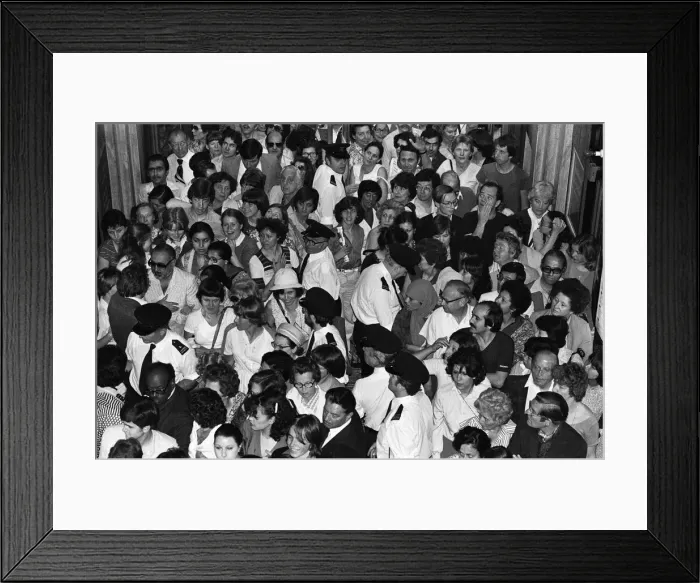 Framed Print : Crowds wait at the entrance to Harrods during the sale. 15th July 1979