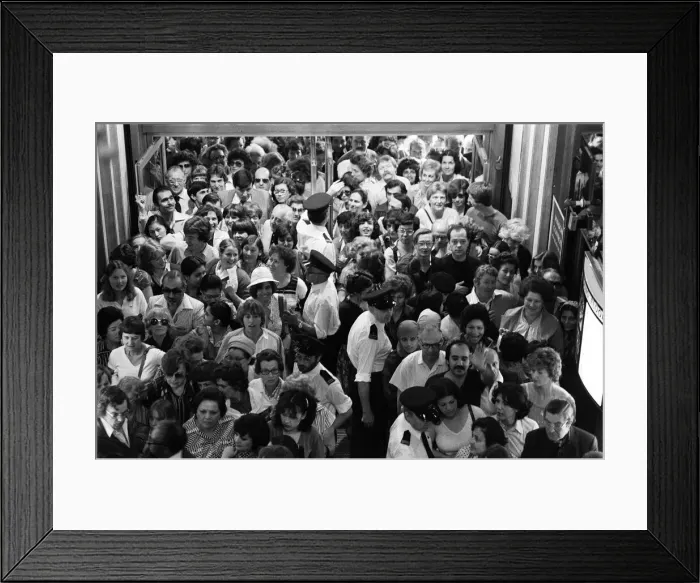 Framed Print : Crowds wait at the entrance to Harrods during the sale. 15th July 1979 Framed Print : Crowds wait at the entrance to Harrods during the sale. 15th July 1979