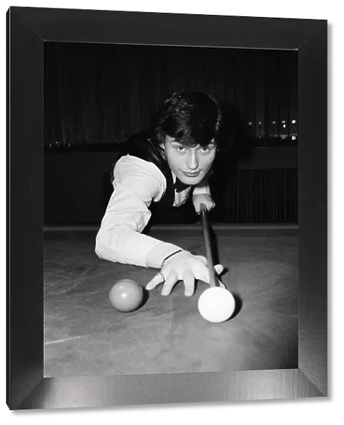 Snooker player Jimmy White pictured at the table at Kingston Snooker Hall where he