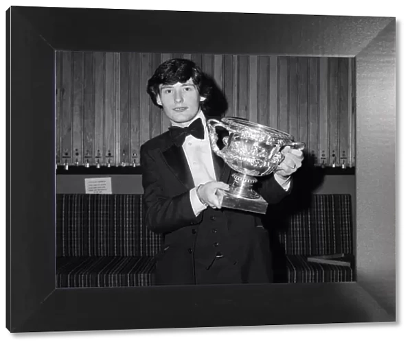 Snooker player Jimmy White pictured receiving a trophy from Cliff Thorburn at Kingston