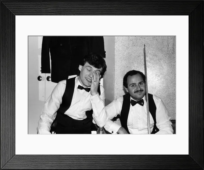 Framed Print : Snooker player Jimmy Whiteshares a joke with a fellow snooker player in the dressing room