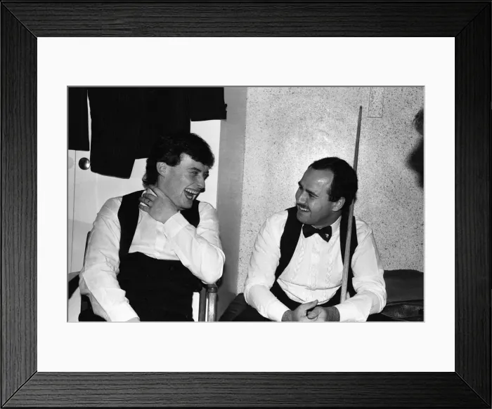 Framed Print : Snooker player Jimmy Whiteshares a joke with a fellow snooker player in the dressing room Framed Print : Snooker player Jimmy Whiteshares a joke with a fellow snooker player in the dressing room