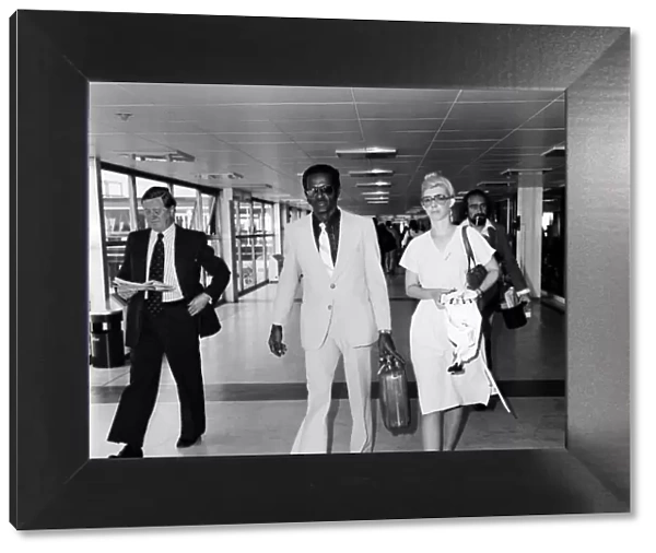 Chuck Berry, an American guitarist, singer and songwriter, at Heathrow Airport