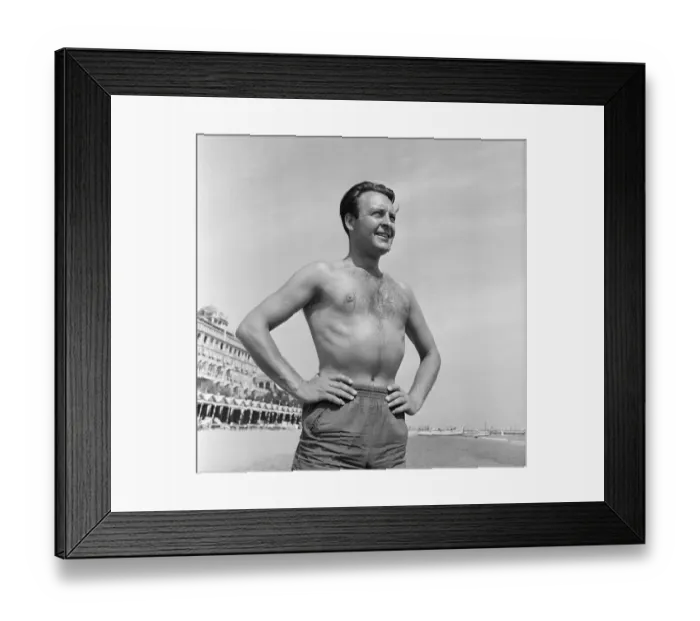 Framed Print : Donald Sinden seen here on the beach during the Venice Film Festival. 8th September 1955