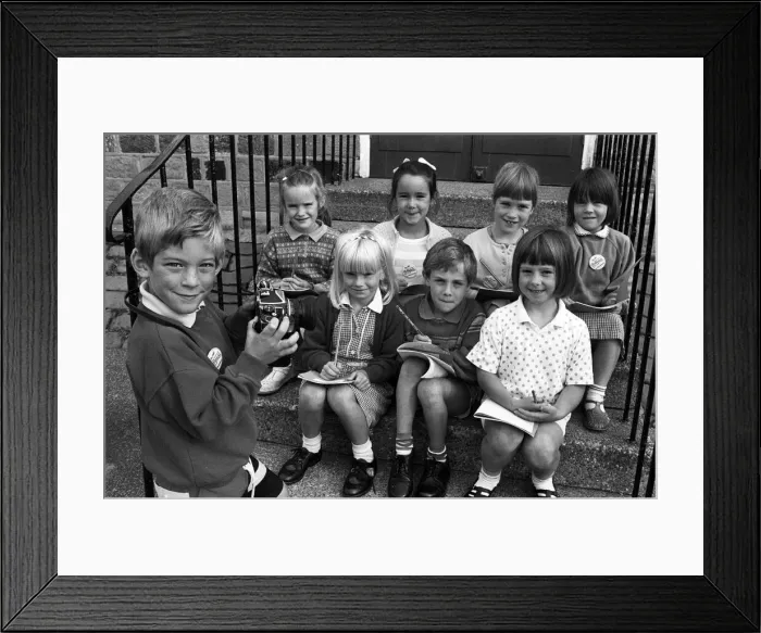Framed Print : Smile please! Six-year-old Adam Bedford puts his reporter colleagues Framed Print : Smile please! Six-year-old Adam Bedford puts his reporter colleagues